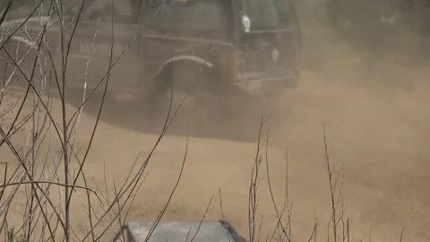 Off-road driving on muddy terrain Stock Footage 335224247