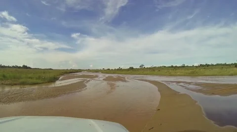 Off-Road Driving On Shallow River With Sunny Day Stock Footage 40452801