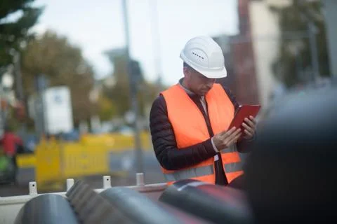 Road engineer using digital tablet Stock Photos