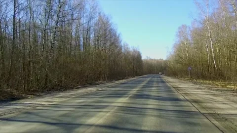 Road with a few trees in the background Видео 297677095