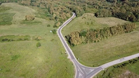 Road forest car on the road quadcopter Stock Footage 149980902