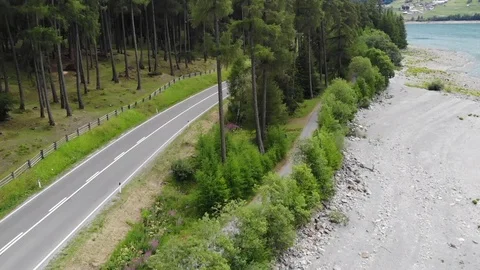 A road in the forest at the seaside Stock Footage 114748691