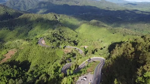 Road in the forest on the top of the mountain  By Drone Stock Footage 304498710