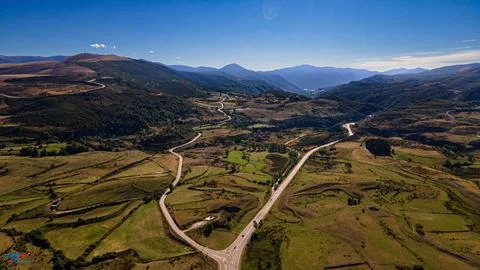 Road fork in nature in view of drone. Stock Photos