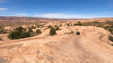 Off road fun recreation slick rock Moab Utah POV 4K Stock Footage 130890339