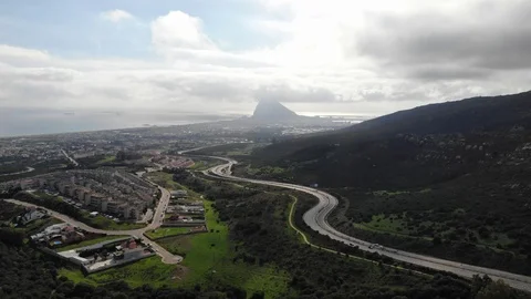 Road to Gibraltar highway, top view from drone. Cars go on highway Video stock 101637665