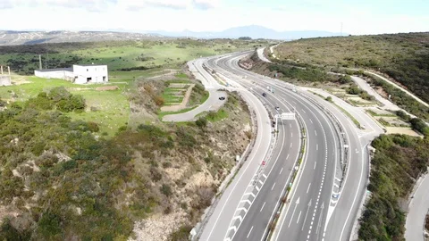 Road to Gibraltar highway, top view from drone. Cars go on highway Stock Footage 101638033