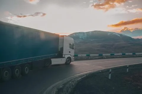 The road goes through the mountain. Stock Photos