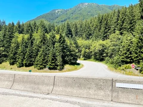 A road going to the mountains Stock Photos