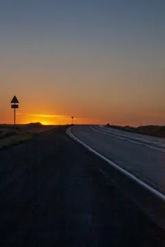 The road going into the sunset Stock Photos