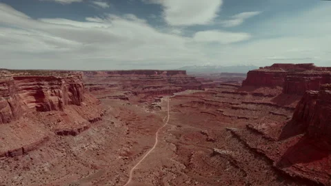 A road going through a barren canyon Stock Footage 255713425