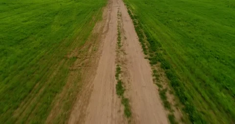 Road going through the field Stock Footage 140740794