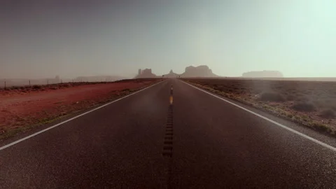 A road going through the Misty valley Stock Footage 255717839
