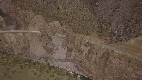 Road going through multiple tunnels in the mountains Stock Footage 166264982