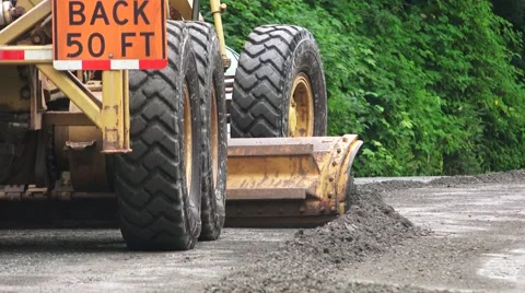 ROAD GRADER, pan right Stock Footage 53853499