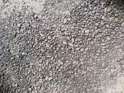 Road grey rough surface texture close up asphalt Stock Photos