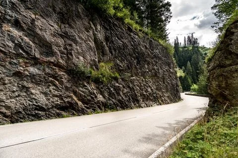 A road with a hill in the background Stock Photos
