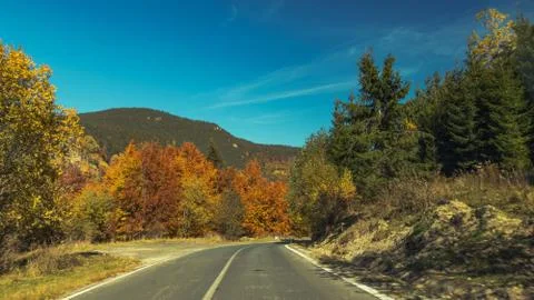 A road in to the hills Stock Photos