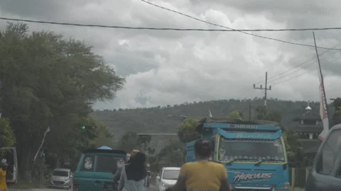 Road with hills in Tuban East Java Stock Footage 248406909