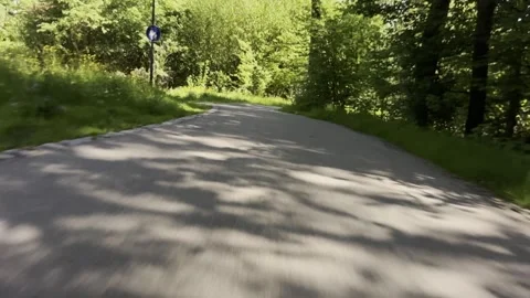 Road with a house in the background Stock Footage 309194676