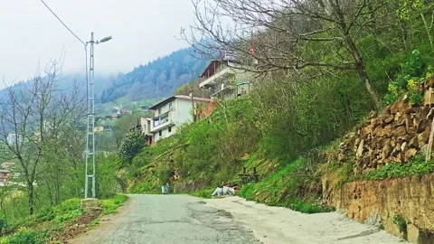 A road with a house on the side Stock Footage 272771485