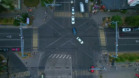 Road intersection with diagonal crossing for pedestrians Stock Footage 278402706