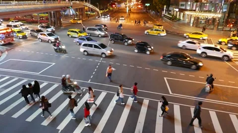 Road intersection top view, regulator controls traffic flow, Taipei 101 Stock Footage 58357464