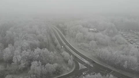 Road Intersection Winter Time, Forest with Fog, Aerial Establishing Stock Footage 146835454