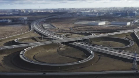 Road juction traffic, tilt shift effect. aerial view. Video stock 125797277