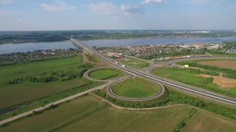 Road junction, bridge over  river  aerial view Stock-Footage 66249992