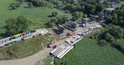 Road junction construction. Bridge construction on suburban road Stock Footage 139813189