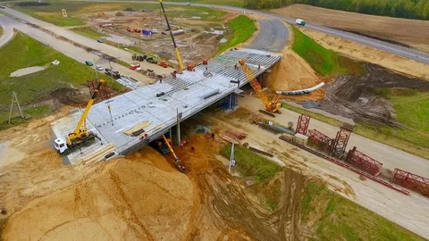 Road junction construction. Top view. Sky view of bridge repair on highway road Stock Footage 78635822