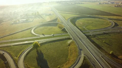 Road junction, freight transport on the road, summer day, aerial. Stock-Footage 96707053