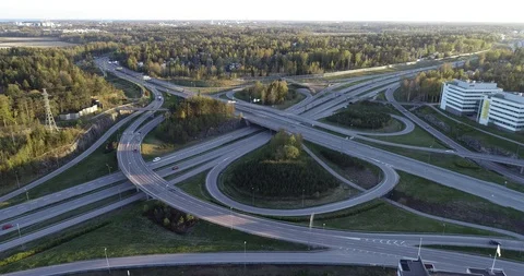 Road junction in a large metropolis. Sunny summer evening, sunset. Stock Footage 107728033