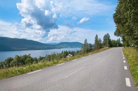 Road by lake Stock Photos
