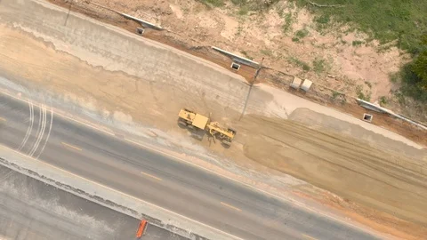 Road leveling equipment motor grader at work Stock Footage 88143199
