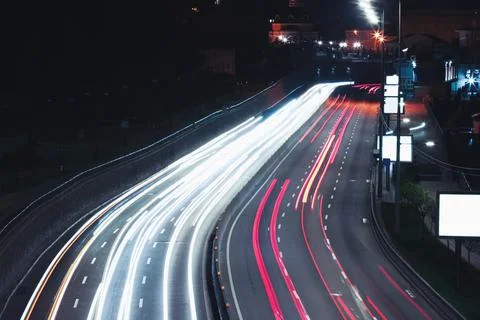 Road with light trails in city, motion blur effect. Night life Stock Photos
