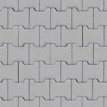 The road is lined with gray bricks.Texture or background Stock Photos