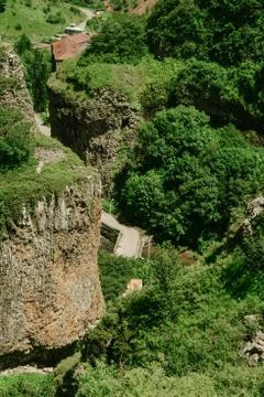 The road is located in the mountains 写真素材
