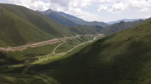 Road in a lush valley Video stock 138478348