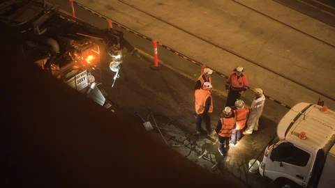 Road maintenance crew working the night shift medium shot 스톡 동영상 97141592