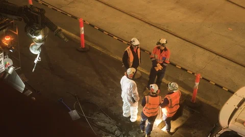 Road maintenance crew working the night shift close shot Stock Footage 97142043