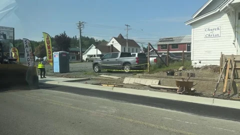 Road maintenance work in the usa workers tractor road warning signs Stock Footage 241544161