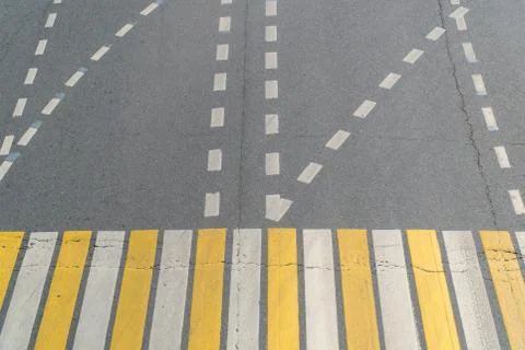 Road marking and pedestrian crossing at the intersection Stock Photos