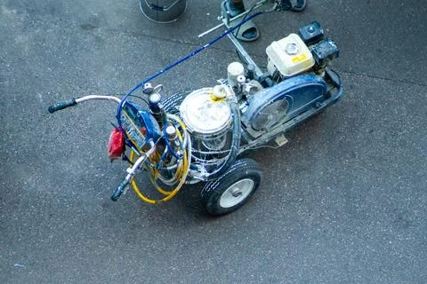 Road Marking Machine for apply lines on asphalt Stock Photos