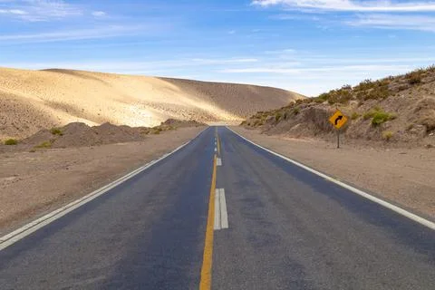 Road in the middle of the desert Stock Photos