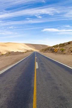Road in the middle of the desert Stock Photos