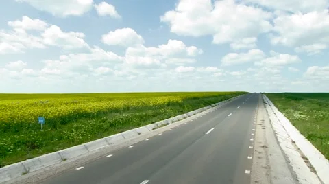 Road in middle of field Stock Footage 43050516