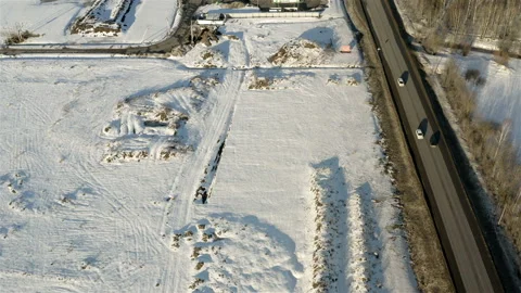 The road in the middle of the snowbound field Stock Footage 111847092