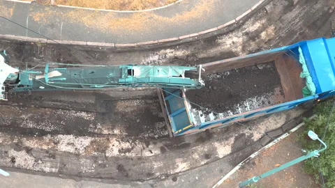 The road milling machine removes the top layer of asphalt Stock Footage 251005012